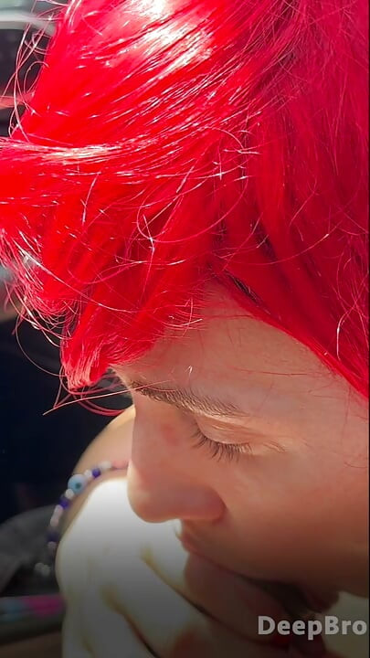 Redhead deepthroats thick BBC in the car, fingers gripping tight