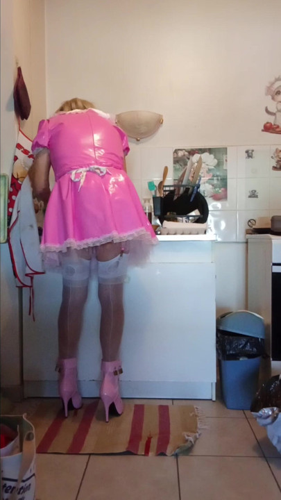 Sissy maid does her Mistress's household chores