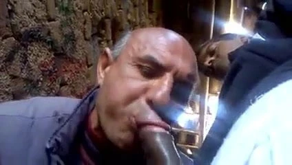 Man suck in the street