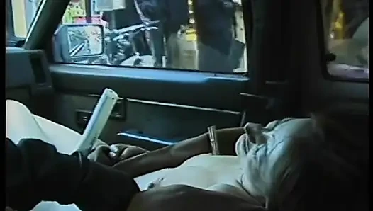 Commuter redhead carpools with creep who debases her in car in city traffic