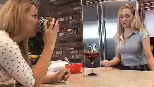 Two hot white lesbian sluts brew some wine and finger fuck each other