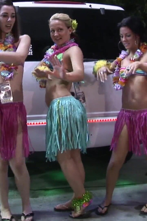 Party girls dressed for Luau get naked in limo