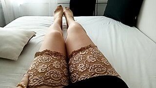 horny MILF tranny in brown lace pantyhose simulates Footjob while playing with vibrator