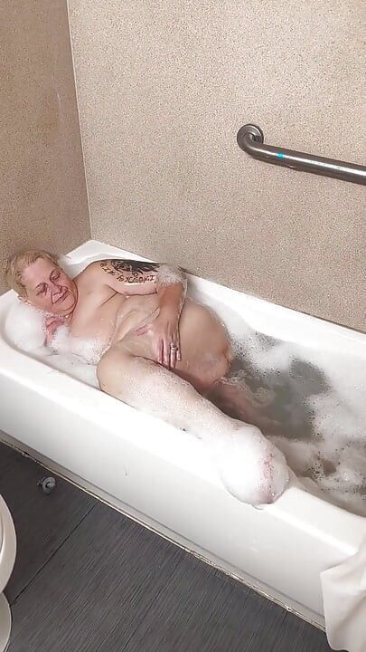 Naughty Bubbler Getting Soapy Masterbating in the Tub Her Pussy She Rubs