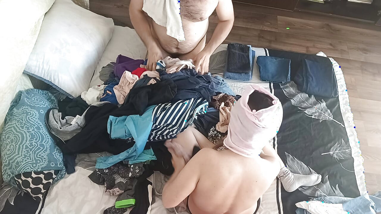 Sensual massage of a sexy couple with oil on the body.