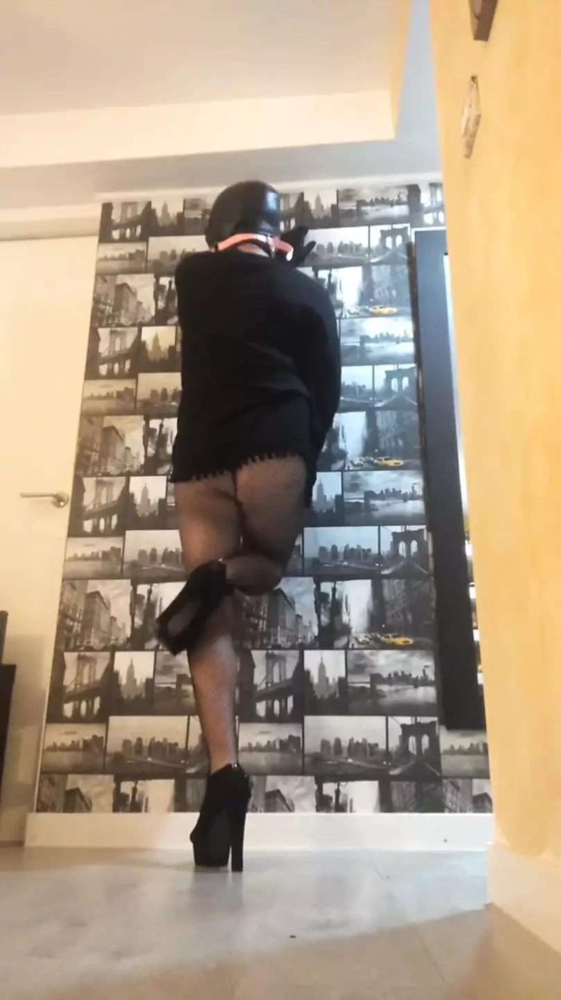 Babe with mask and gag in stockings and heels