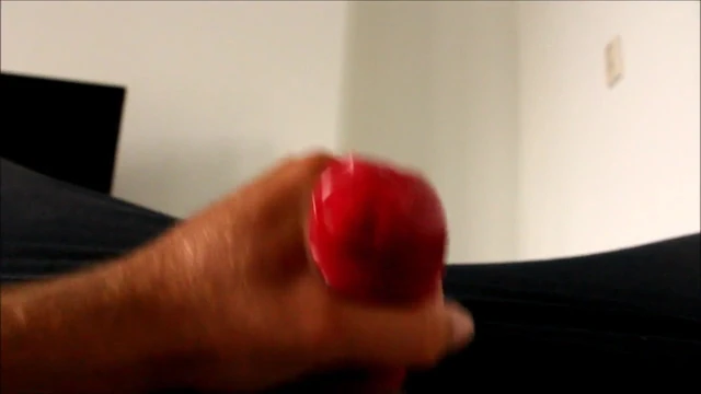 J-Art male solo cock stroking with a condom on 2