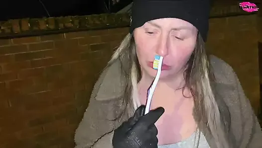 Street girl fucks Herself with a toothbrush!