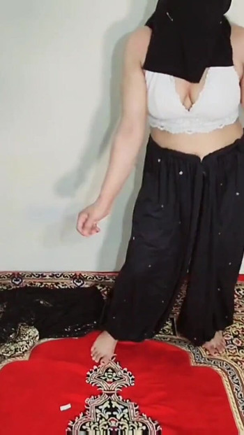 Emotional moment from "Arabic sexy hot girl wearing black hijab in house doing sensual dance, Desi Indian slut Amrozia"