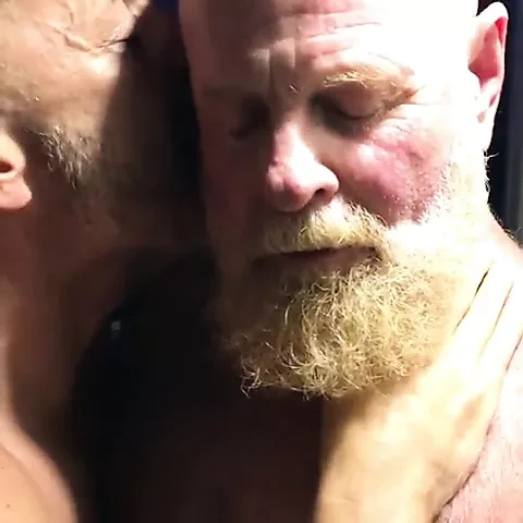 He resists being kissed....a bit