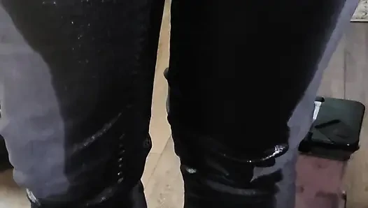 Desperate wetting black jeans in my living room