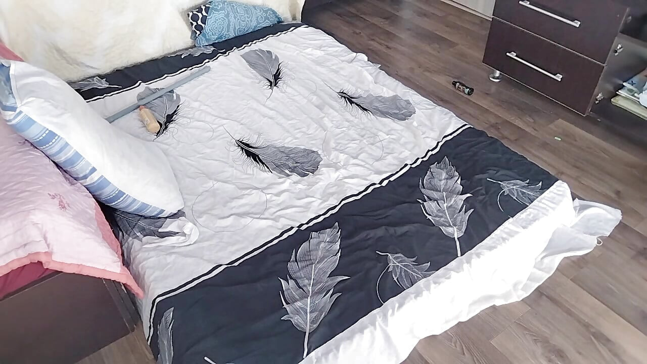 Sensual massage of a sexy couple with oil on the body. Foreplay in the bedroom with an amateur couple.