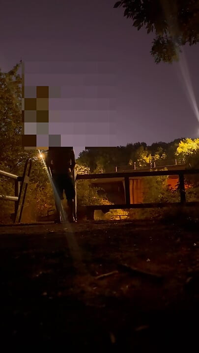 Undressing in view of traffic and walking naked in the road