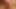 セクシーな女が巨大なペニスが剃った秘部を突き刺す中、快感に喘ぐ