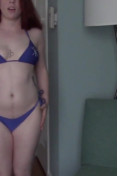 Tattooed Redhead Bikini Tease