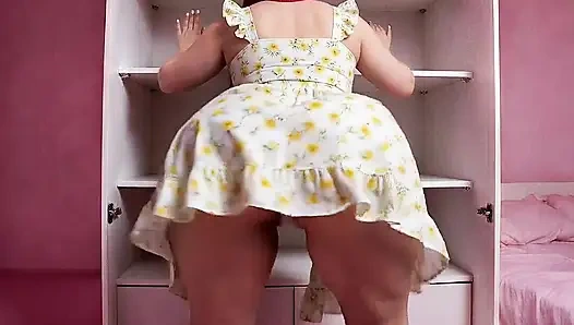 big-bottomed woman in a dress, moving it