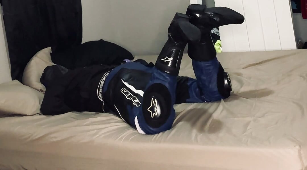 Biker in A Straitjacket and Tied