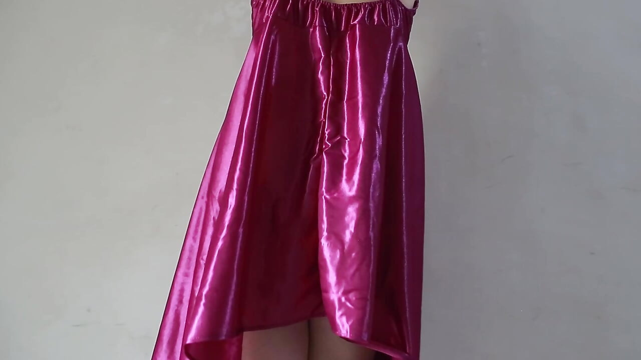 A GIRL WHO WEARS A SEXY SATIN DRESS IN THE LATEST INDO