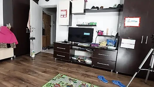 Sexy brunette doing naked chores around the house.