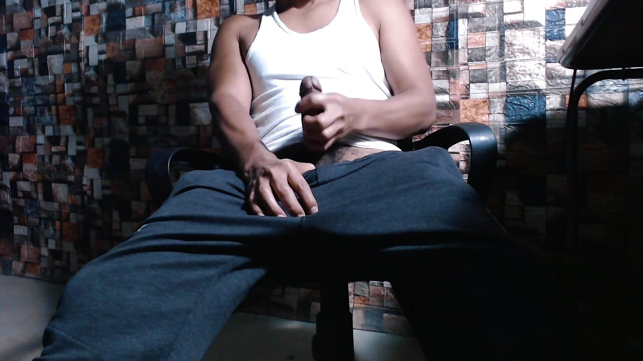 Solo male in athletic wear reaching orgasm