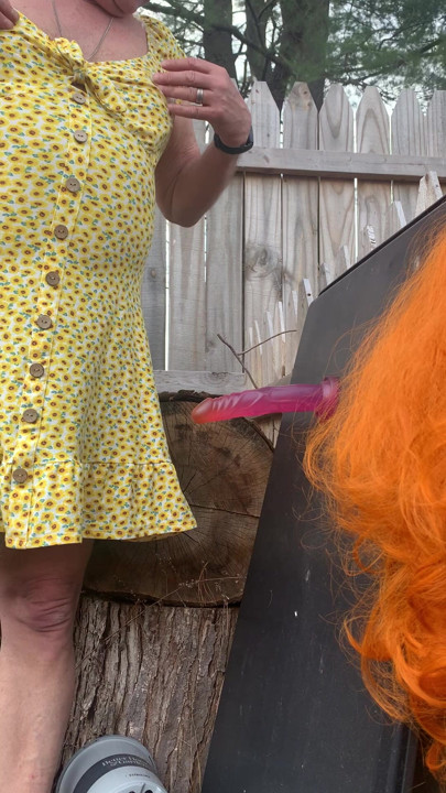 Sissy getting ready to suck some dildo