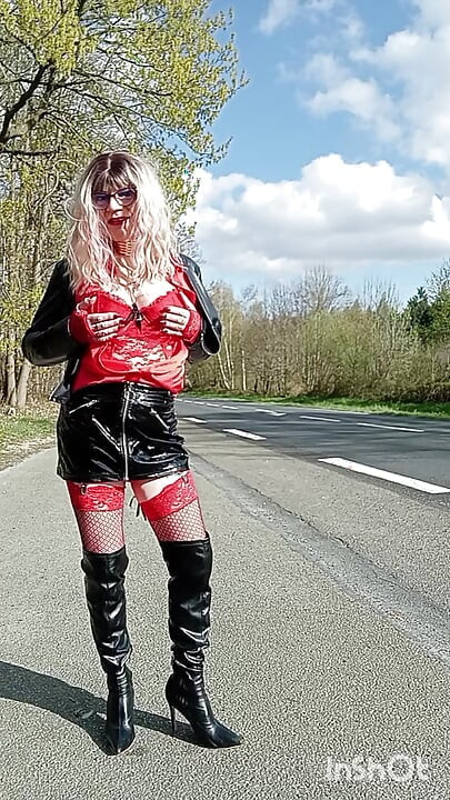 The slut prostitutes herself in the forest and by the roadside, masturbates in her car.