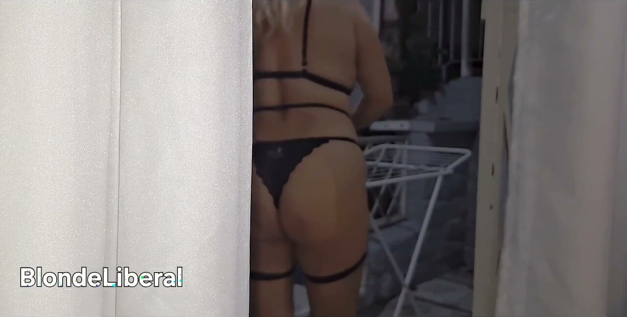 A Shameless Housewife Showing off to Passersby on the Street While Her Husband Is at Work