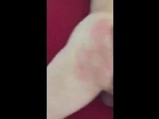 Man getting spanked with hairbrush