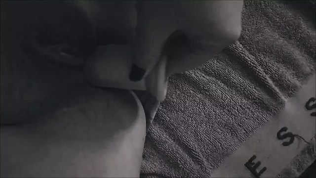 A curvy woman masturbates solo