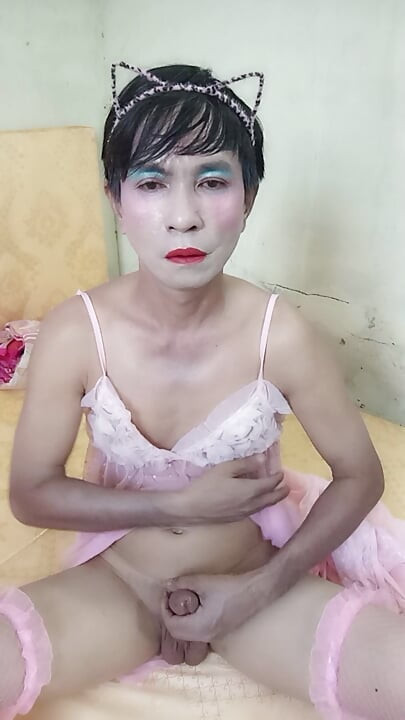 Oanh Le transgender wearing a sexy robe masturbating happily