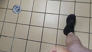 Playing inside and outside around a public bathroom
