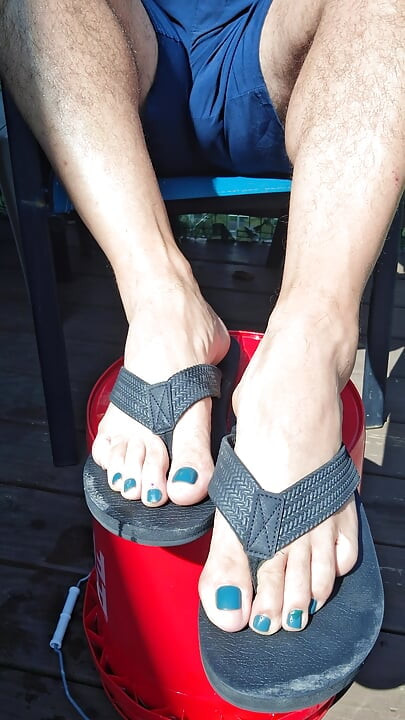 Showing off my painted toes and flip flops