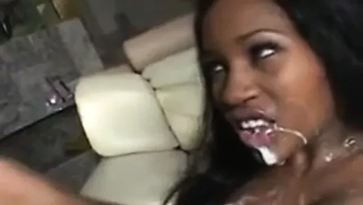 Cum on an ebony face and tits