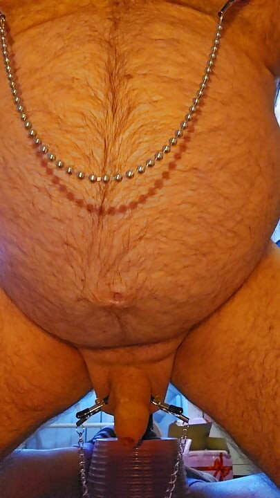 Dildo fucking with nipples clamps