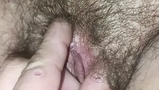 My wife's hairy wet cunt close-up