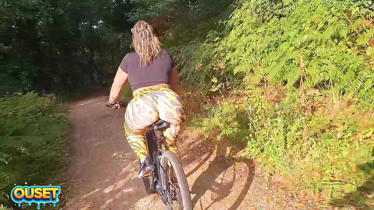 Big ass in tight leggings rides through the woods on a bike and ends up sucking and fucking outdoors with her huge ass