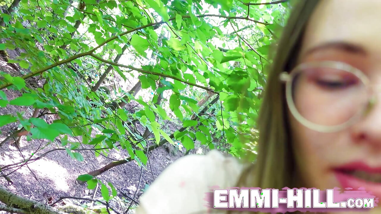 Wild fingering in the woods: Emmi plays with her long labia and jerks off her wet pussy hard