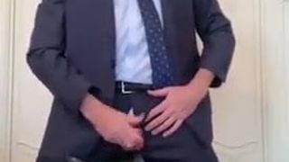 suited fag eats his cum shake
