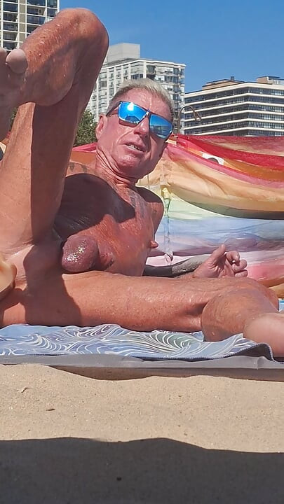 Key West oiled up using his new larger dildo at the beach