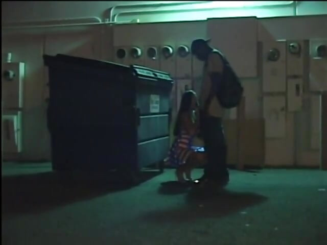 Horny cougar sucks a big black dick in the alley