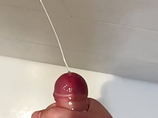 Een beetje plezier met mijn pik onder de douche in slow motion