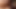 セクシーな赤毛の観光客が暑さの中でコックに乗る