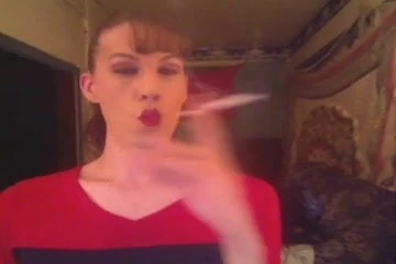 MILF smoking a long cigarette