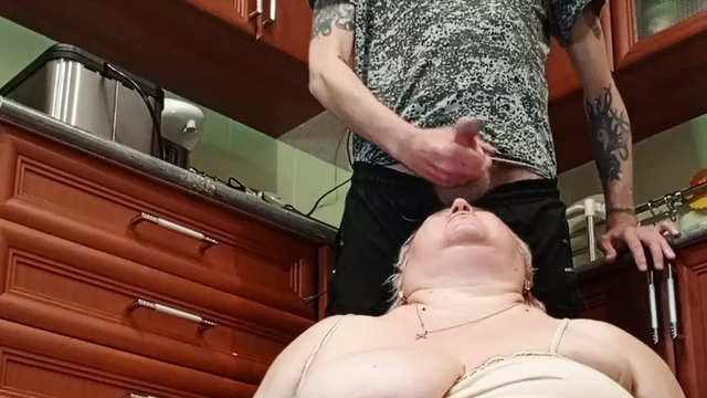 hot cum in stepmom's mouth after jerking off a dick in the kitchen
