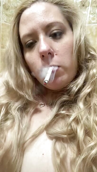 Sexy smoking in the bathroom