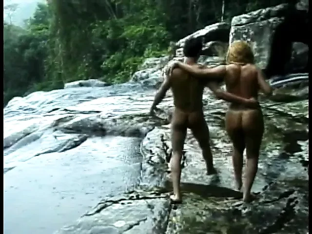 Pretty young blonde with huge ass takes young stud's big cock by a stream