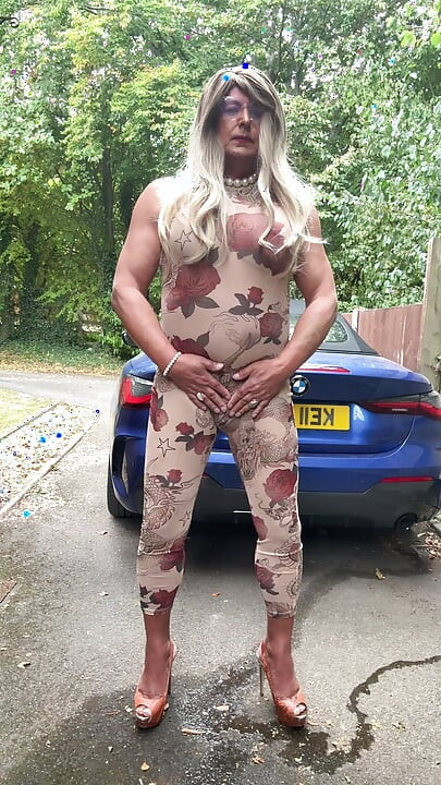 Sexy Crossdresser kellycd2022 in sexy floral see thru catsuit and heels