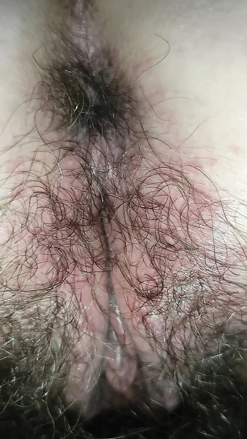 Hairy pussy from behind fingering