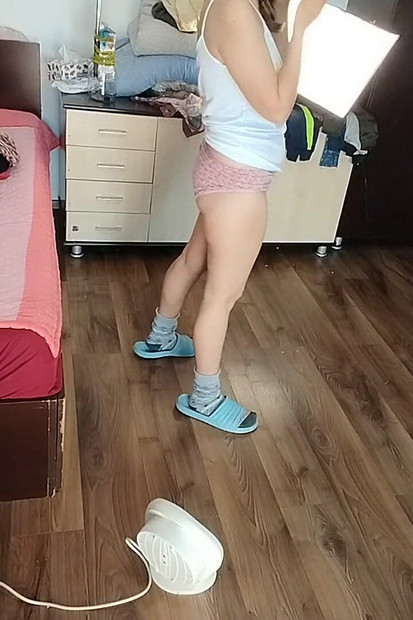 Sexy Brunette Having Fun Trying on Clothes. Sexy Mom Dances Naked Around the House.