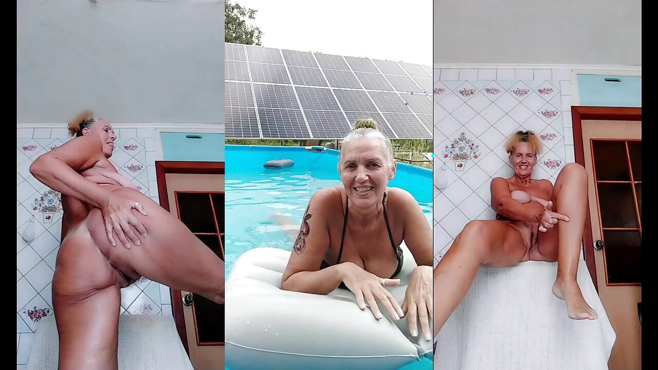 Vruća domaćica Lukerya na odmoru kraj vode